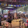 Reinaldinho leva alegria e anima��o � Praia do Bosque durante Temporada de Praia 2026