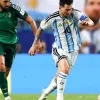 Messi faz tr�s gols e Argentina vence Arg�lia na estreia da Copa