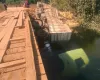 Homem morre afogado ap�s carreta com milho cair de ponte em rio em Mato Grosso