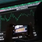 Investidores apontam regulacao e economia como maiores riscos do Bitcoin