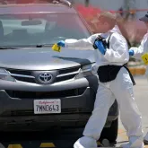 Corpo encontrado em carro perto de est�dio onde treina a sele��o do Ir�