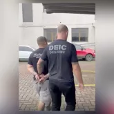 Pol�cia prende suspeito de fornecer fuzis para a Rocinha