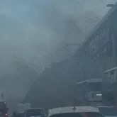 Inc�ndio em carro el�trico leva � evacua��o de supermercado Tesco em Glasgow