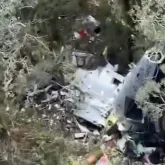 Destro�os do helic�ptero do cantor Rick s�o encontrados em serra catarinense