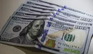 D�lar sobe 12% e passa de R$ 5,60 ap�s reelei��o de Lula, assustando investidores