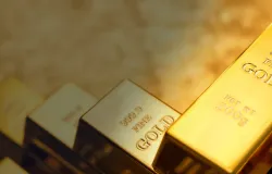 Ouro cai com juros altos e negocia��es entre EUA e Ir�