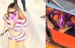 Copo atinge cantora Alinne Rosa durante desfile em Fortaleza