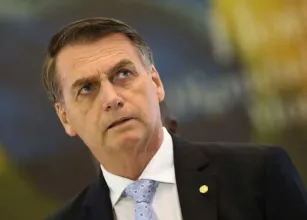 TSE libera uso da foto de Bolsonaro em santinhos de aliados; entenda