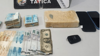 Homem  preso com tablete de cocana e R$ 22 mil em espcie