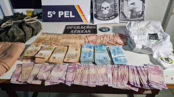 Policiais localizam em mata outra parte do dinheiro roubado de cooperativas no Norto