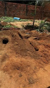 Pol�cia encontra corpo enterrado em quintal e prende tr�s pessoas em MT