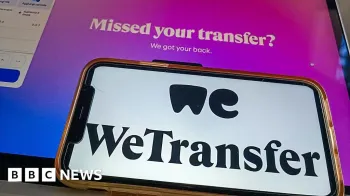 Getty Images Um telefone com o logotipo WeTransfer na tela, em cima de um tablet mostrando a p�gina inicial do WeTransfer