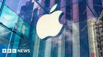 O logotipo da Apple em uma janela, com uma cena da cidade, incluindo arranha-c�us refletidos na janela