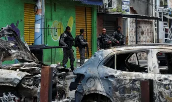 Members of the military police special unit patrol a street during a police operation against drug trafficking at the favela do Penha, in Rio de Janeiro, Brazil October 28, 2025. REUTERS/Aline Massuca/Proibida reprodu��o