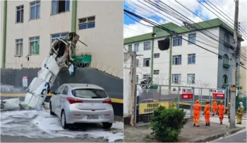 Ap�s bater no pr�dio de apartamentos, o avi�o caiu em uma �rea de estacionamento