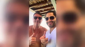 Fl�vio ao lado de Sic�rio de Vorcaro (Foto: Obtido pela Jovem Pan)