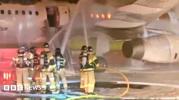 Bombeiros combatem inc�ndio em aeronave