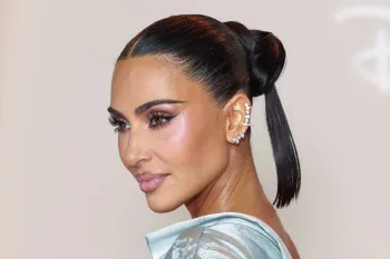 Kim Kardashian est� colocando os holofotes nas m�es do beisebol (Imagem: Getty)